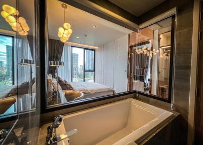 Bathroom with view into a bedroom