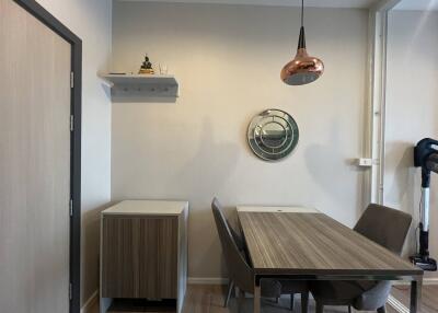 Modern dining area with table and chairs