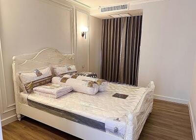 Modern bedroom with bed and air conditioning