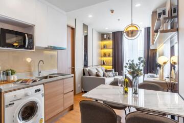 Modern open-plan living room with kitchen and dining area