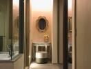 Interior hallway with a decorative mirror and seating area