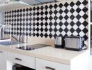 Modern kitchen with checkerboard backsplash