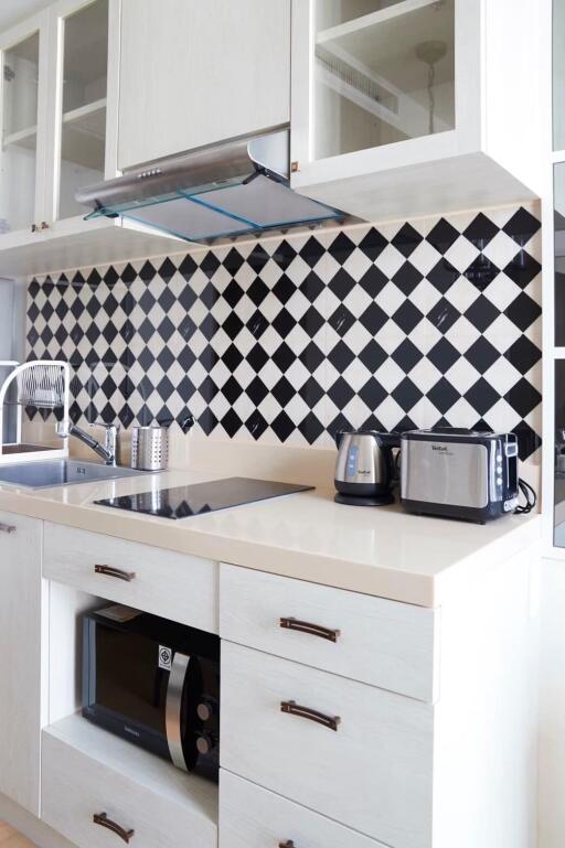 Modern kitchen with checkerboard backsplash