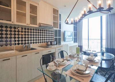 Modern kitchen with dining area and large window