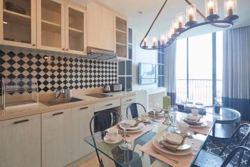 Modern kitchen with dining area and large window