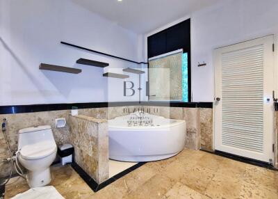 spacious bathroom with modern amenities