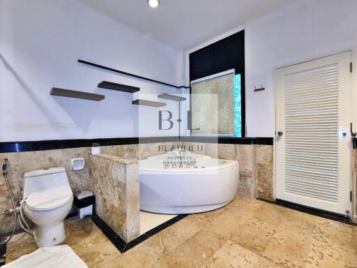 spacious bathroom with modern amenities