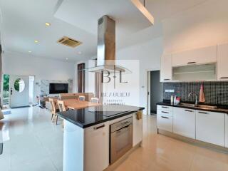 Modern kitchen with open layout and dining area