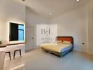 Spacious bedroom with modern furnishings