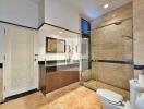 Modern bathroom with glass-enclosed shower