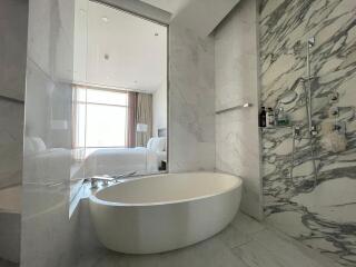 Luxurious bathroom with bathtub and shower