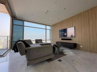 Modern living room with city view and balcony