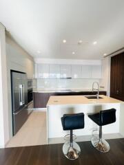 Modern kitchen with island and bar stools