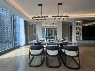 Modern dining area with large windows and city view