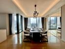 Modern dining area with large windows and city view