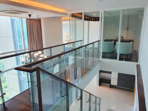 Modern interior with glass railings and large windows