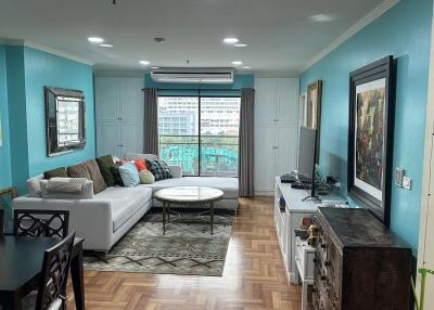 Living room with modern decor and large window