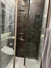 Modern bathroom with glass shower enclosure