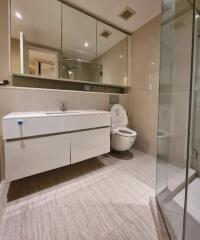 Modern bathroom with glass shower and vanity