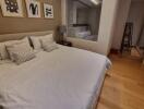 Spacious bedroom with large bed and ensuite bathroom