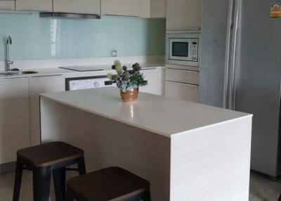 Modern kitchen with island and stools