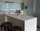 Modern kitchen with island and stools