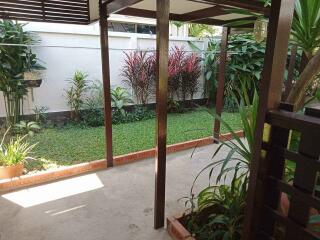 Covered patio with garden view