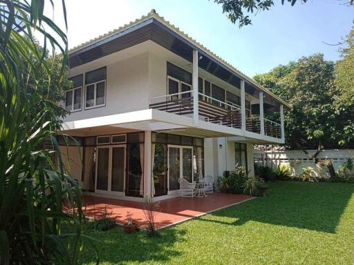 Two-story modern house with garden