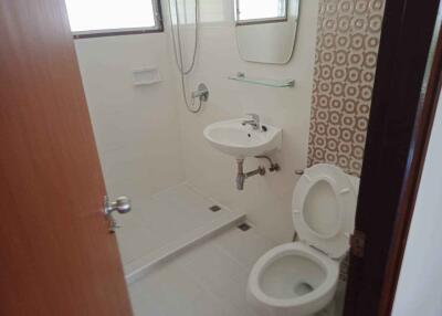 Bathroom with shower, toilet and sink