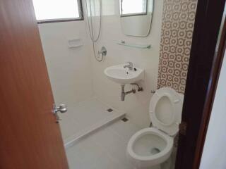 Bathroom with shower, toilet and sink