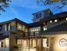 Front view of a modern house exterior at dusk