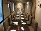 Large dining area with an extended table setup for a formal meal