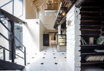 Modern open-plan hallway with high ceiling