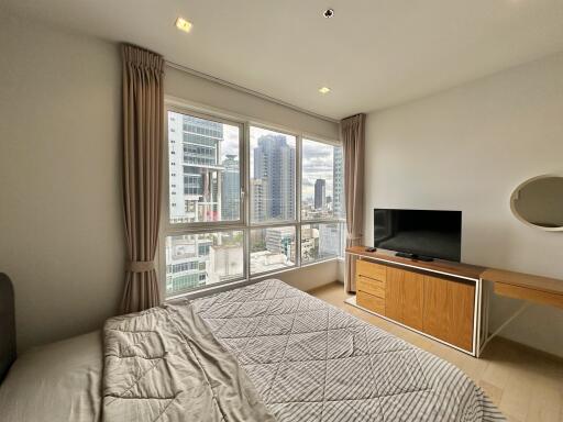 Modern bedroom with city view