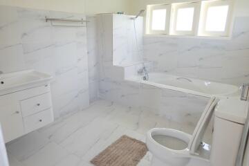 Spacious bathroom with modern fixtures