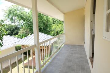 Spacious balcony with railing and scenic view