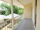 Spacious balcony with railing and scenic view