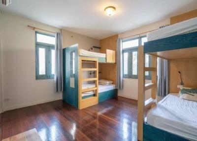 Spacious shared bedroom with bunk beds