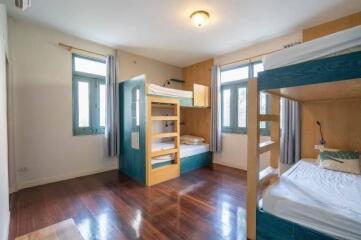 Spacious shared bedroom with bunk beds