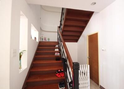 Interior staircase with wooden steps