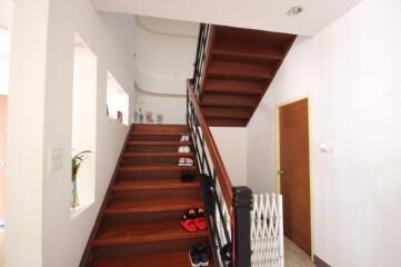 Interior staircase with wooden steps