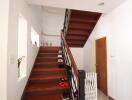 Interior staircase with wooden steps