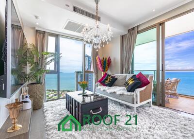 Spacious 2-Bedroom Corner Unit on the Highest Floor with Sea View & Balcony Jacuzzi—Steps from Jomtien Beach!