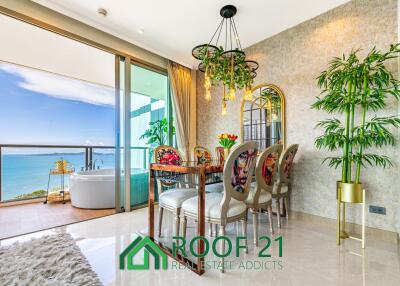 Spacious 2-Bedroom Corner Unit on the Highest Floor with Sea View & Balcony Jacuzzi—Steps from Jomtien Beach!