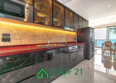 Spacious 2-Bedroom Corner Unit on the Highest Floor with Sea View & Balcony Jacuzzi—Steps from Jomtien Beach!