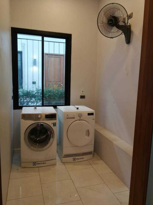 Laundry room with washer and dryer