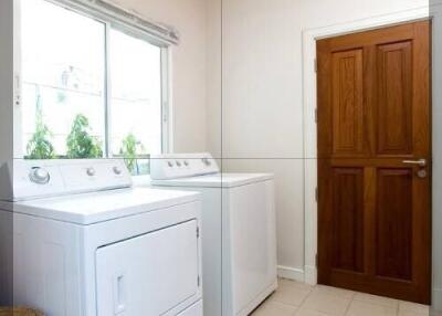 Laundry room with washer and dryer