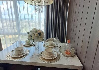 Elegant dining area with a decorative chandelier