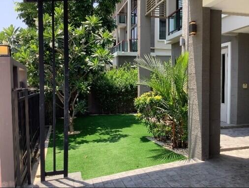 entrance to residential building with garden