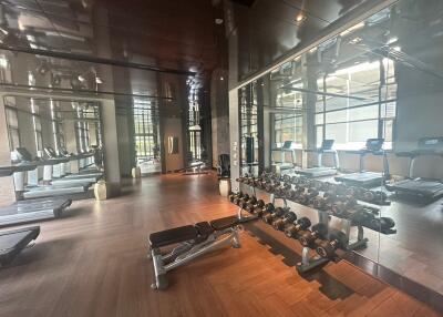 Modern fitness center with various exercise equipment